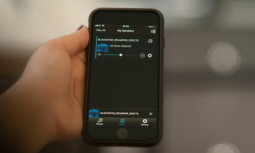 hand holding phone with Drumfire Blackstar Edition app open