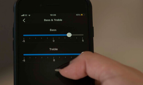close up of hand holding phone with Drumfire Blackstar Edition app open